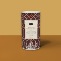 Zylindrische Schachtel mit Rautenmuster, für 72°N Champagne Chocolat Luxemburg Schokolade, 8 Stück, 80g.