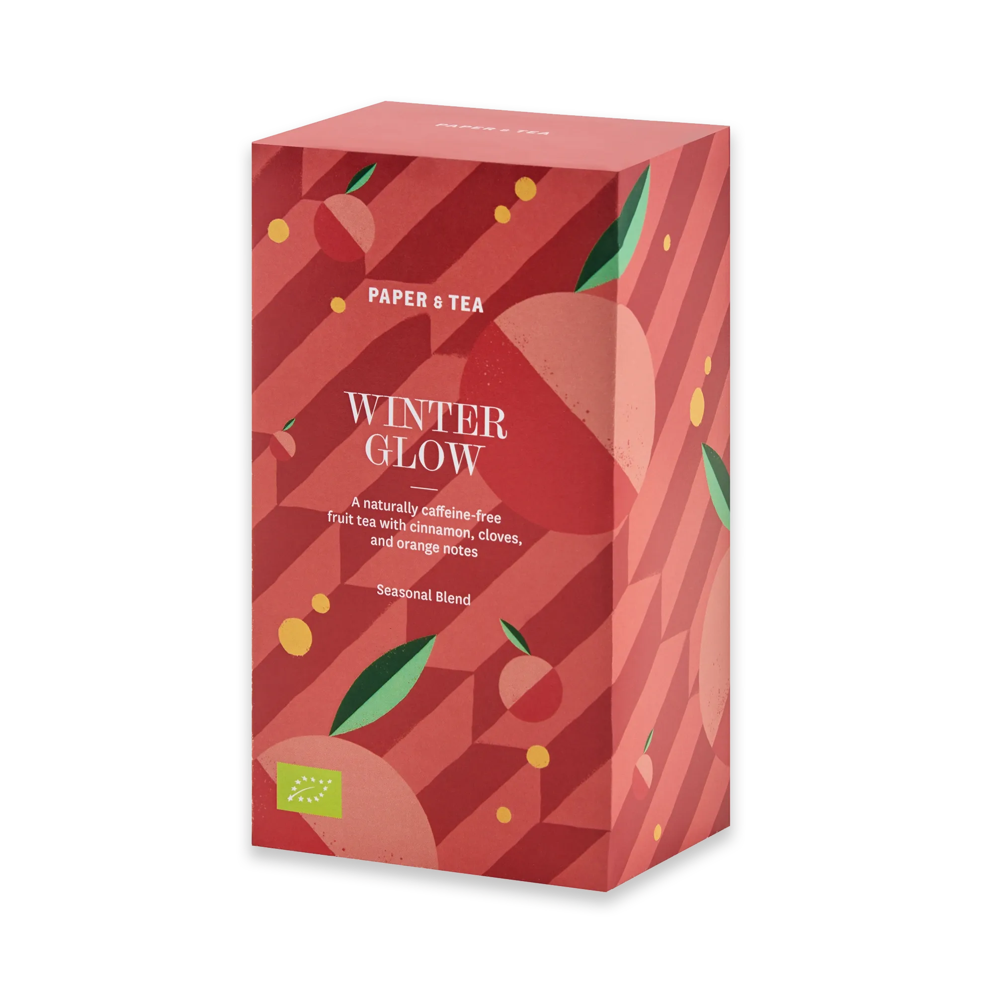 Rote Paper & Tea Winter Glow Teepackung mit geometrischen Mustern und Zitrusfrüchten.