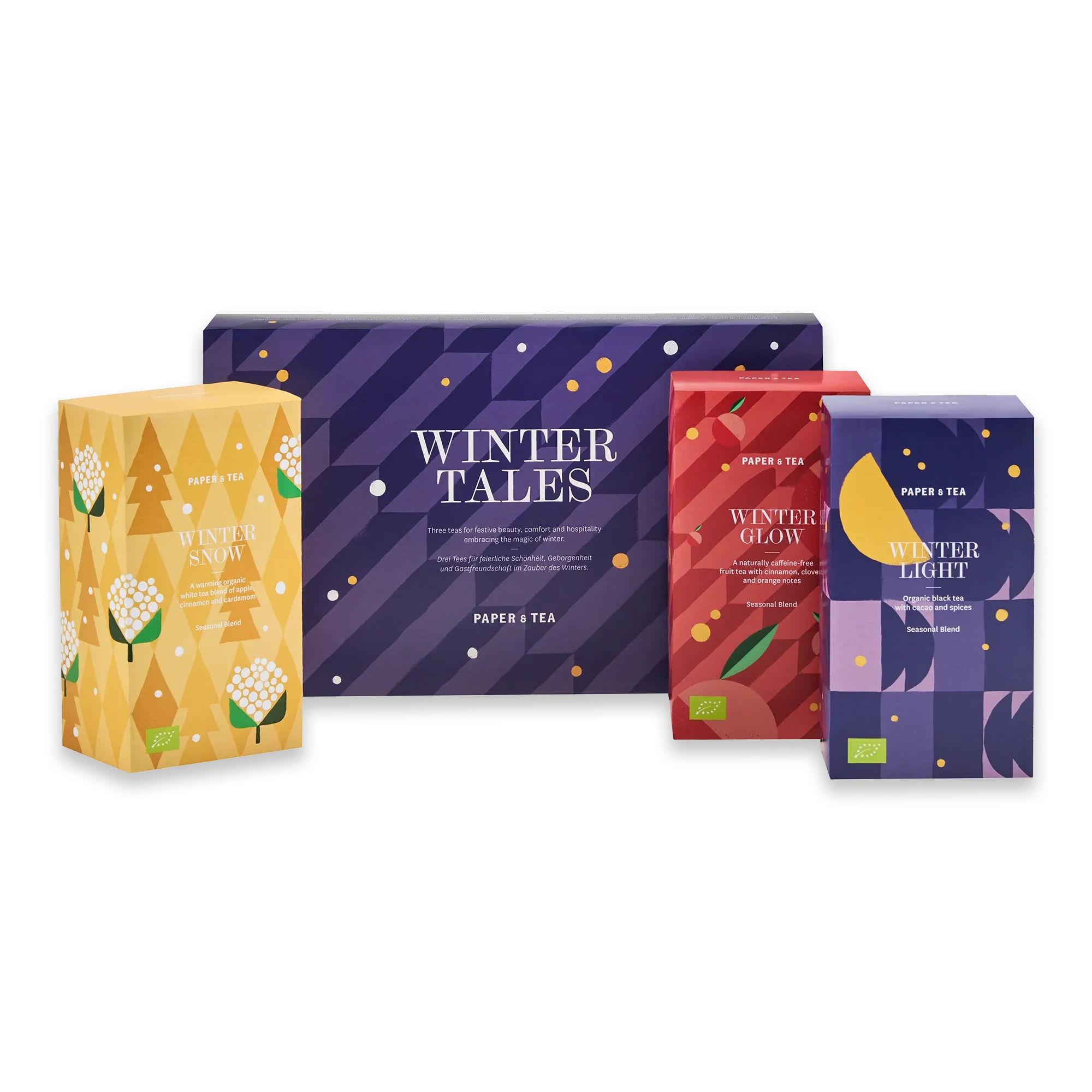 Vier farbenfrohe Papier & Tee Winter-Teeboxen mit weißem, schwarzem und Früchtetee.